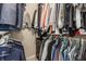 Walk-in closet providing ample storage space with clothing racks and shelving at 10380 Sand Creek Blvd, Fishers, IN 46037