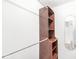 Walk-in closet featuring shelving, clothes rails, a mirror and white walls at 1044 Timber Creek Dr # 2, Carmel, IN 46032