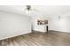 Spacious living area with hardwood floors offering seamless flow and neutral paint at 1044 Timber Creek Dr # 2, Carmel, IN 46032