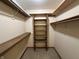 Spacious walk-in closet provides ample storage with built in shelves at 10976 Mt Vernon N Trl, Indianapolis, IN 46229