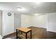 Finished basement with wood look floors and ample natural light at 1120 W 5Th St, Greenfield, IN 46140