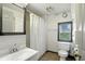 Full bathroom with vanity and shower tub combo at 1120 W 5Th St, Greenfield, IN 46140
