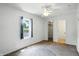 Bright bedroom with ceiling fan and good natural light at 1120 W 5Th St, Greenfield, IN 46140