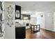 Functional kitchen with dark cabinetry, modern appliances, and ample counter space for meal preparation at 1120 W 5Th St, Greenfield, IN 46140