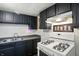 Close up of the kitchen with modern gas range, and neutral decor at 1120 W 5Th St, Greenfield, IN 46140