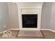 Cozy fireplace with white mantel creating a warm and inviting focal point in the living space at 1128 Brookside Ct, Avon, IN 46123
