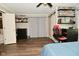 Bedroom with wood-look floors and open closet at 11522 Newport Dr, Indianapolis, IN 46236