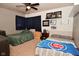 Bedroom with two beds, ceiling fan, and closet storage at 11522 Newport Dr, Indianapolis, IN 46236