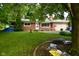 Charming single-story brick home with a well-maintained front yard, offering a welcoming curb appeal at 11522 Newport Dr, Indianapolis, IN 46236