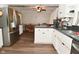 The kitchen features white cabinets, stainless steel appliances, and modern countertops at 11522 Newport Dr, Indianapolis, IN 46236