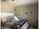 Bedroom with vaulted ceiling and decorative wall shelves at 1165 Tewksbury Ct, Mooresville, IN 46158