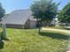 Lovely home showcasing its brick and siding exterior, attached garage, and well-maintained lawn in a residential neighborhood at 1165 Tewksbury Ct, Mooresville, IN 46158