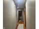 Hallway leading to bathroom with tile floor at 1165 Tewksbury Ct, Mooresville, IN 46158