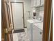 Laundry room features a white washer and dryer set at 1165 Tewksbury Ct, Mooresville, IN 46158