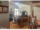 Bright living room with hardwood floors, vaulted ceilings, and brick fireplace at 1165 Tewksbury Ct, Mooresville, IN 46158
