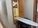 Built-in ironing board cabinet offers space-saving convenience and additional storage at 1165 Tewksbury Ct, Mooresville, IN 46158
