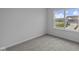 Bedroom with neutral carpet, and a large window with a view of the houses nearby at 12490 Morning Ridge Way, Noblesville, IN 46060