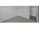 Neutral bedroom with carpet, closet and door leading to the hallway at 12490 Morning Ridge Way, Noblesville, IN 46060
