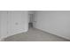 Bedroom with neutral carpet, closet, and door leading to the hallway at 12490 Morning Ridge Way, Noblesville, IN 46060