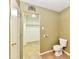 Bathroom featuring a toilet and open doorway to a walk-in closet at 1252 Jasmine Dr, Greenfield, IN 46140