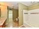 Bathroom featuring a vanity, toilet, and bathtub with a patterned backsplash at 1252 Jasmine Dr, Greenfield, IN 46140
