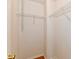 Walk in closet with ample storage space, metal shelving units and wood floors at 1252 Jasmine Dr, Greenfield, IN 46140