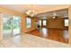 Inviting living room featuring tile and wood flooring, natural light, and a cozy atmosphere for gatherings at 1252 Jasmine Dr, Greenfield, IN 46140