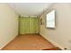 Neutral room with light walls, a window, and a curtain at 1252 Jasmine Dr, Greenfield, IN 46140