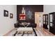 Elegant dining room with modern chandelier, glass table, and stylish decor for a sophisticated dining experience at 12535 Old Pond Rd, Noblesville, IN 46060