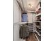 Walk-in closet with custom shelving and storage solutions at 12535 Old Pond Rd, Noblesville, IN 46060