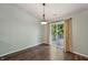 Cozy dining area with hardwood floors and a sliding door leading to the deck at 12848 Patrick Ct, Fishers, IN 46038