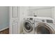 Convenient laundry room featuring a modern washer and dryer set at 12848 Patrick Ct, Fishers, IN 46038