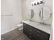 Stylish bathroom featuring double sinks, marble countertops, and modern fixtures at 1359 Shadow Ridge Rd, Indianapolis, IN 46280