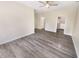 Bright bedroom featuring a ceiling fan, walk-in closet, and neutral color scheme at 1359 Shadow Ridge Rd, Indianapolis, IN 46280