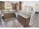 Modern kitchen featuring stainless steel appliances, wood cabinets, and granite countertops at 1359 Shadow Ridge Rd, Indianapolis, IN 46280