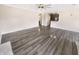 Open living room features hardwood floors and a ceiling fan at 1359 Shadow Ridge Rd, Indianapolis, IN 46280