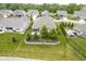 Landscaped backyard featuring lush greenery, mature trees, and an inviting patio area in a peaceful setting at 16209 Natures Way, Westfield, IN 46074