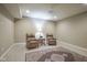 Finished basement featuring neutral walls and carpet with two sitting chairs and an area rug at 16209 Natures Way, Westfield, IN 46074