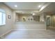 Finished basement wet bar with granite counters, stainless steel sink, and access to storage space at 16209 Natures Way, Westfield, IN 46074