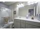 Bathroom with walk-in shower, neutral walls and tile floors, and a large vanity at 16209 Natures Way, Westfield, IN 46074
