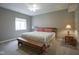 Bedroom with neutral colored walls, carpet, ceiling fan, and a queen sized bed at 16209 Natures Way, Westfield, IN 46074