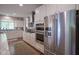 Modern kitchen features stainless steel appliances and ample cabinet space at 16209 Natures Way, Westfield, IN 46074