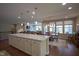 Spacious kitchen island overlooks the dining and living areas at 16209 Natures Way, Westfield, IN 46074