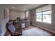 Comfortable home office featuring hardwood floors, a large window, and classic furnishings at 16209 Natures Way, Westfield, IN 46074