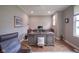 Comfortable home office featuring hardwood floors, a large window, and classic furnishings at 16209 Natures Way, Westfield, IN 46074