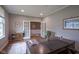 Bright home office with hardwood floors, white trim, and plenty of natural light at 16209 Natures Way, Westfield, IN 46074