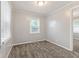 Bright bedroom with neutral paint and carpet at 1631 S Post Rd, Indianapolis, IN 46239