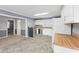 Bright kitchen features stainless steel appliances, tiled floors, and ample cabinet space at 1631 S Post Rd, Indianapolis, IN 46239