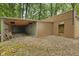 Storage shed and additional open-air parking, surrounded by a gravel yard at 1631 S Post Rd, Indianapolis, IN 46239