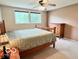 Cozy bedroom with natural light and a view of the landscape at 1802 Laurel Dr, Columbus, IN 47203